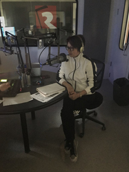 Jenny Hong from CHKT-AM1430 in Toronto broadcast live from a lights-off studio. Thanks to the skylight nearby, it was a little dark but manageable.