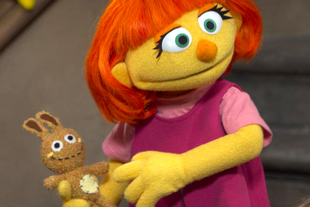 美國兒童節目《芝麻街》，今年四月起加入了一個新的角色 Julia，是一個四歲的紅頭髮小妹妹，有自閉症，節目的製作機構希望藉此鼓勵大家接受並多關心自閉症人士。